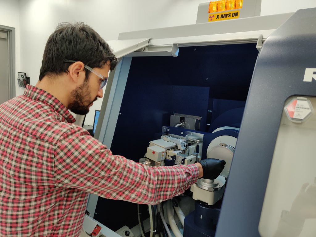 Man working on Xray machine in science 1